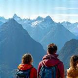 Image representing tourists in Switzerland with mountains